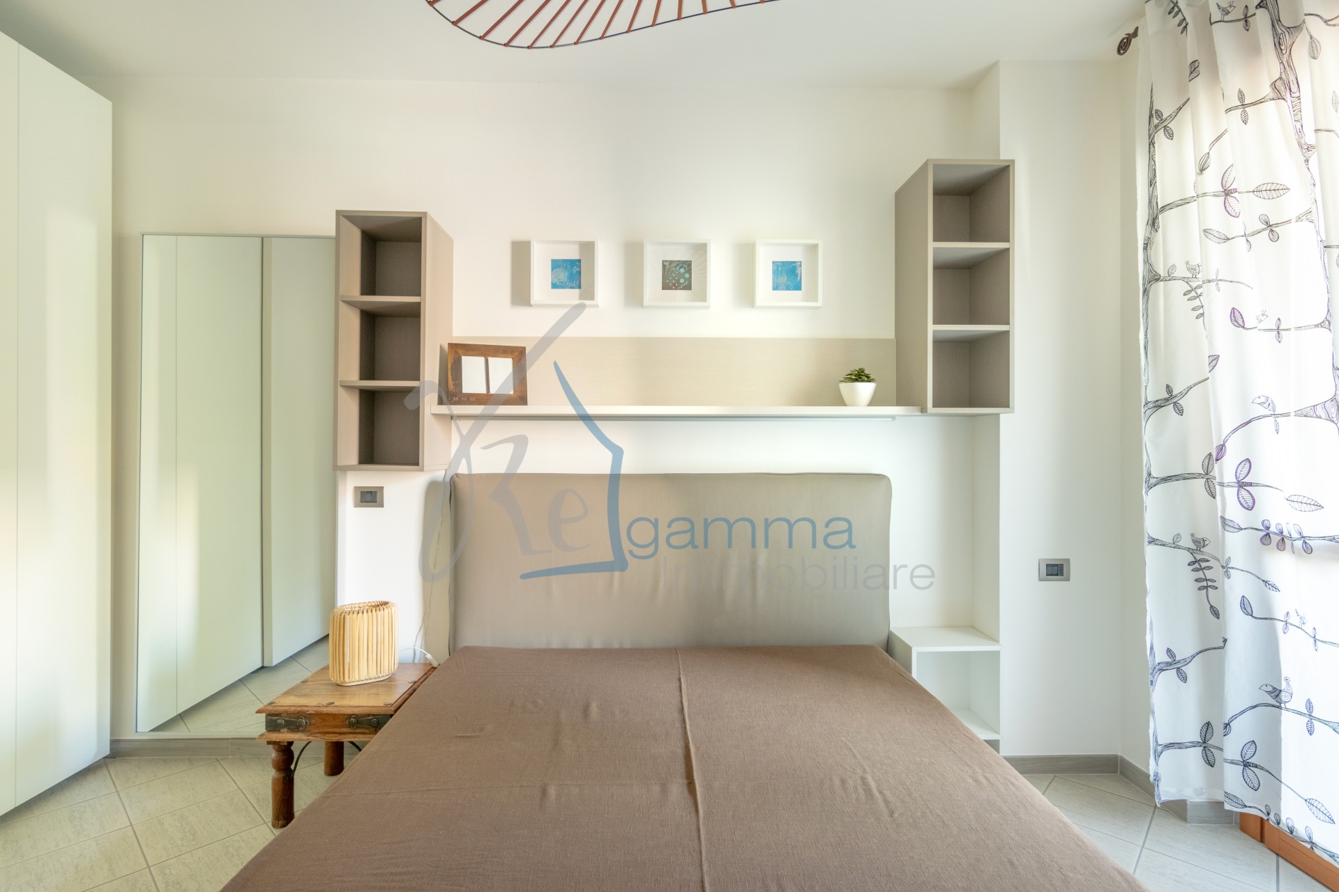 camera_da_letto_bilocale_locazione_via_avezzana_regamma_immobiliare(0)